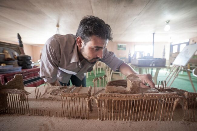 Jordan. Artists in Za’atari refugee camp recreate Syrian historic sites.